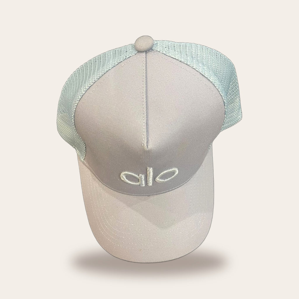Alo Yoga District Trucker Hat in Sky Blue, top view with embroidered alo logo – real photo