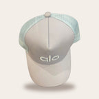 Alo Yoga District Trucker Hat in Sky Blue, top view with embroidered alo logo – real photo