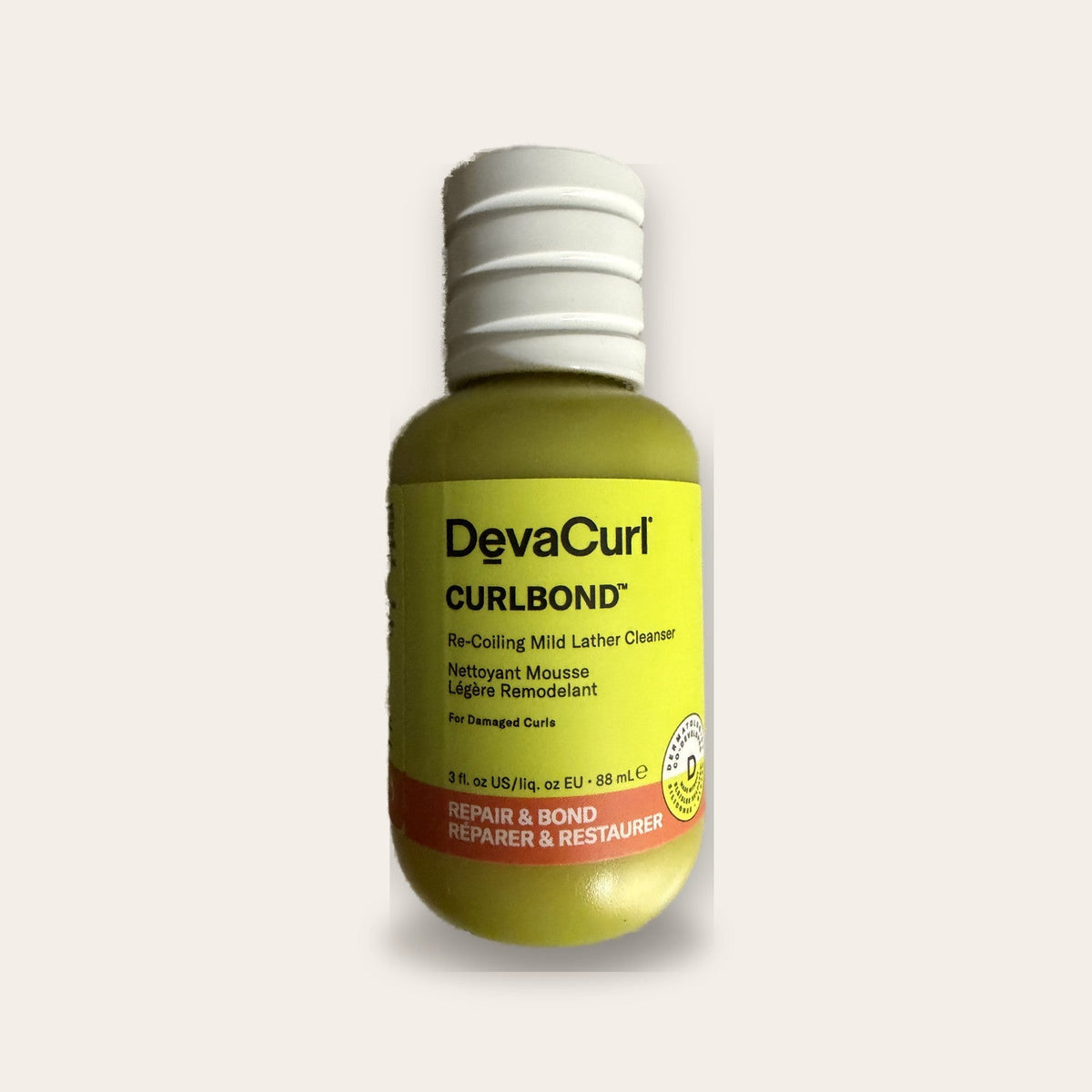 DevaCurl CurlBond Re-Coiling Mild Lather Cleanser 3 oz travel bottle, front