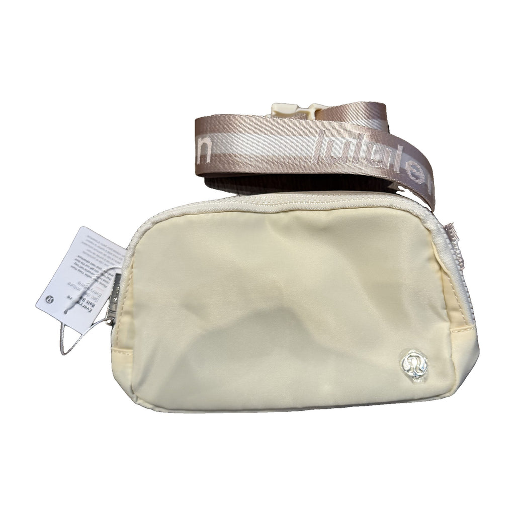 Lululemon Everywhere Belt Bag 1L in Ivory with logo strap – real photo