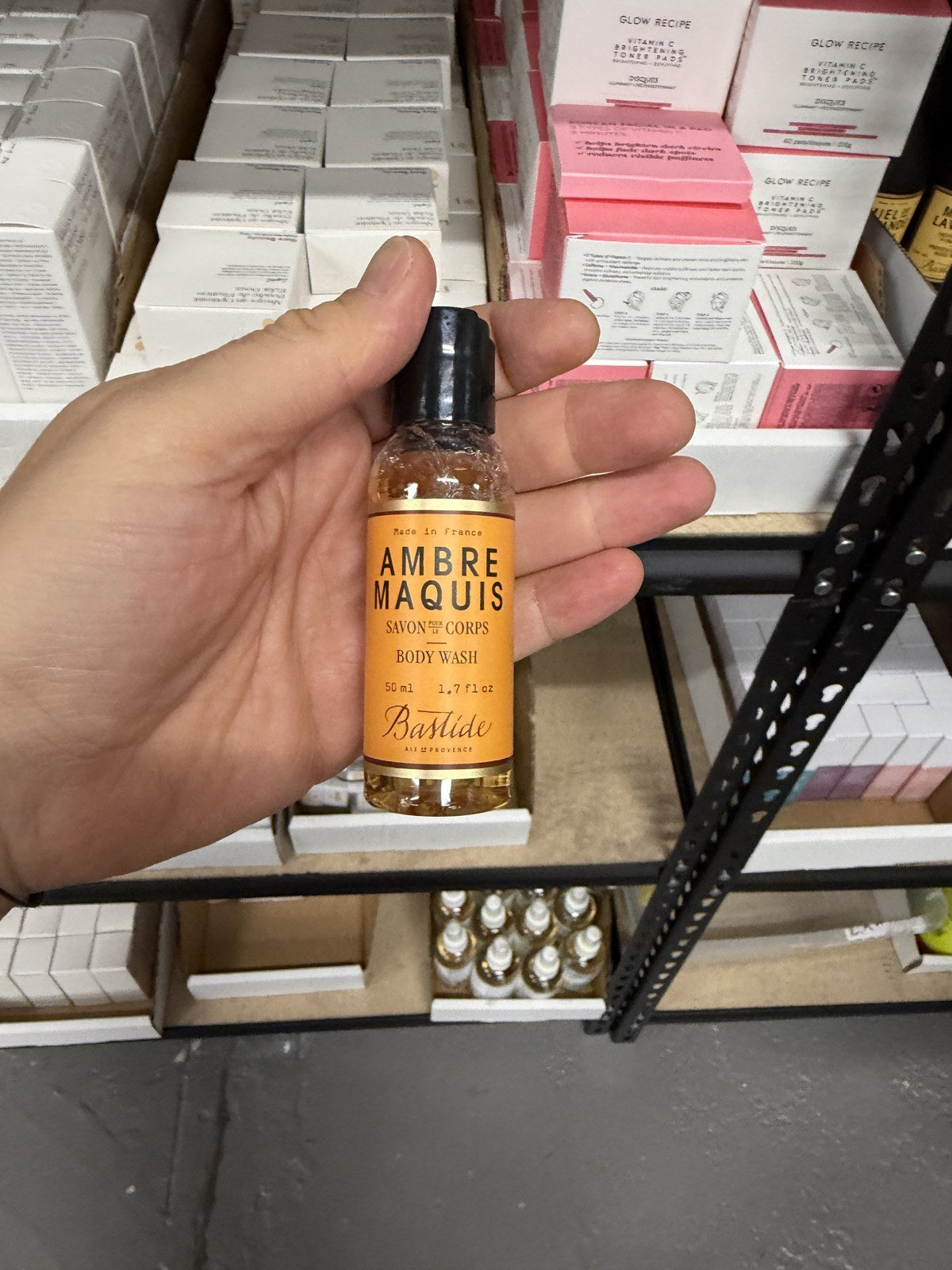 Bastide Ambre Maquis Body Wash in hand
