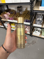 Victoria's Secret Coconut Passion Shimmer Fragrance Mist in hand
