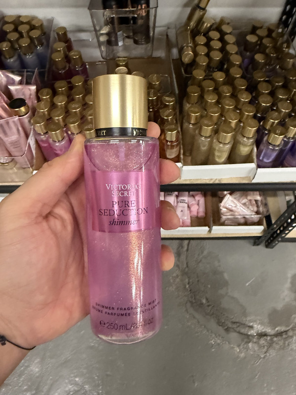 Victoria's Secret Pure Seduction Shimmer Fragrance Mist in hand